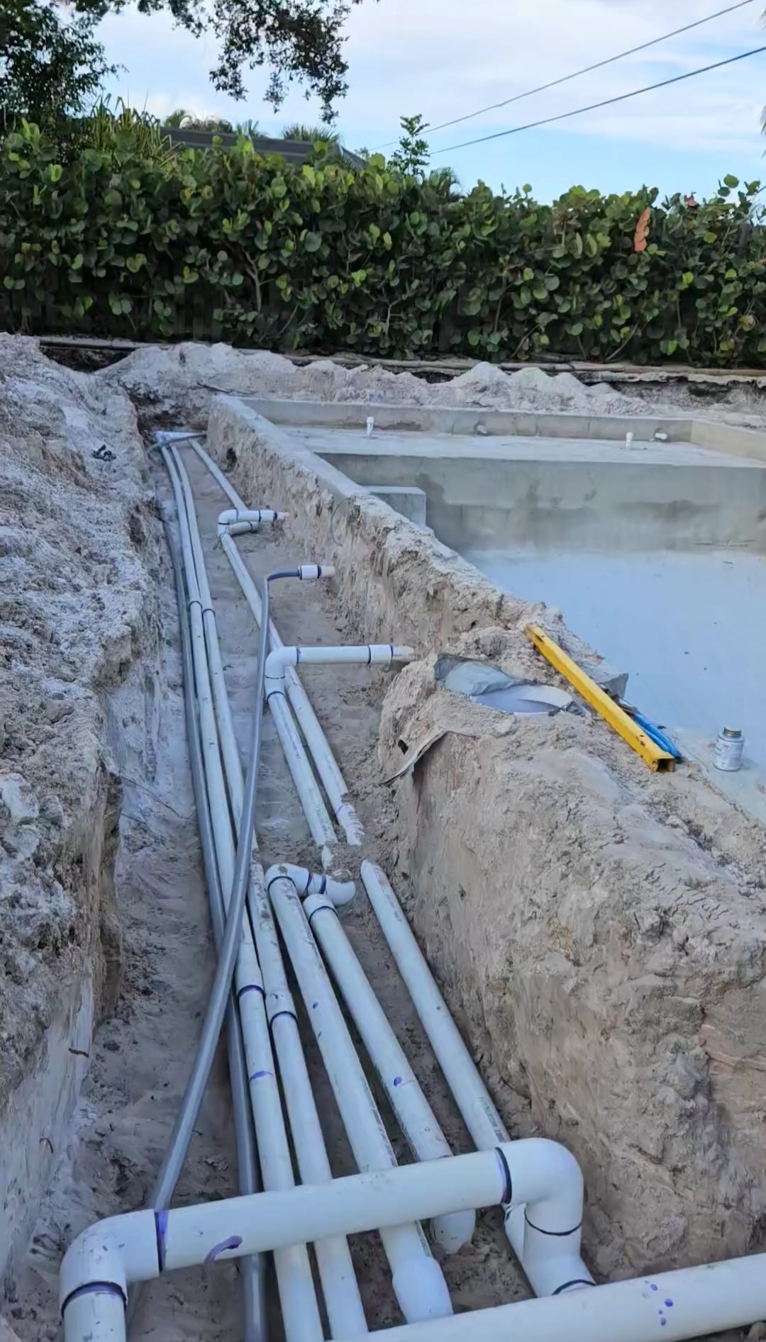 Perimeter Plumbing and Electrical For New Pool Construction Building